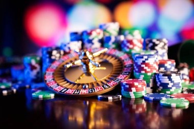 Live dealer casino studio with multiple camera angles and chat interface visible